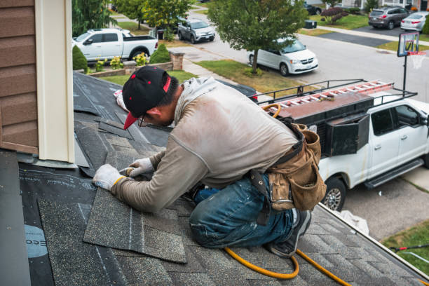 Professional Roofing technician working in Richland, IN